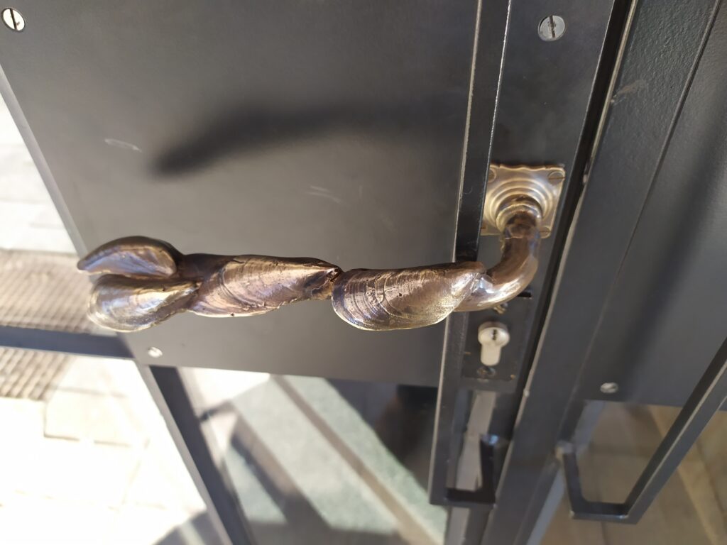 Deurklink Kaat Mossel